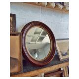 Victorian oval walnut mirror