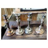 4 SILVER PLATED CANDLESTICKS 4 SILVER PLATED CANDLESTICKS