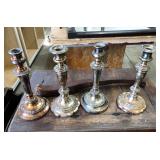 4 SILVER PLATED CANDLESTICKS