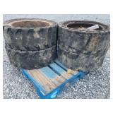 Set Of (4) Used Solid Flex Skid Loader Tires