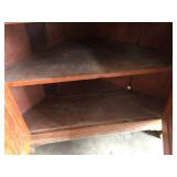INTERIOR OF CORNER CUPBOARD
