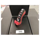 Assorted Rings in shoe ring holder