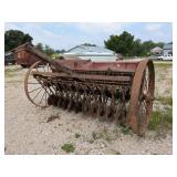 Antique Steel Wheel Wheat Drill