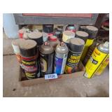 Spray Cans of Assorted Product Partials