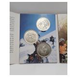 2010 Canadian Tire $1 coins in Holder