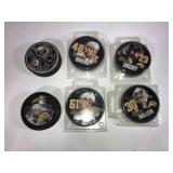 Sabres hockey pucks (6) Mid-2000