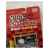 A Pair of NASCAR Die-Cast Model Car Sets Including