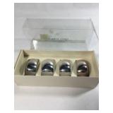 Four silver plated napkin rings