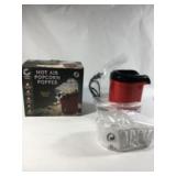Hot air popcorn popper by complete cuisine ,box