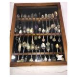 Vintage souvenir, spoon collection in wood display