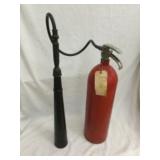 Vintage red carbon dioxide fire extinguisher from