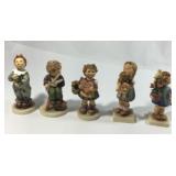 Five collectible Hummels figurines ,they are