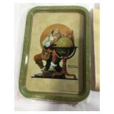 Norman Rockwell metal tray depicting Santa Klos