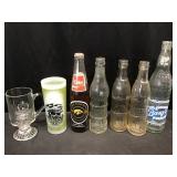 Pop bottles, glasses