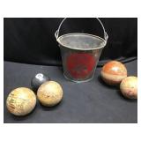 Old Milwaukee bucket and Vintage balls