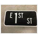 East 1st Sign