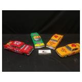 Four Die Cast Race Cars