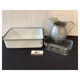 Metal pitcher, glass and metal dishes