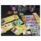 Pokémon Trading Cards and Tin with Game Pieces