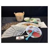 Hand Fans in Wood Bucket