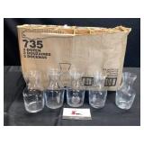 Three Dozen Glass Decanters