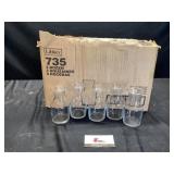 Three Dozen Glass Decanters