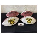 Four New Footballs