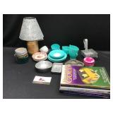 Miscellaneous tea set dishes, candles, books