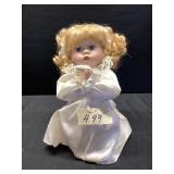 Praying Doll