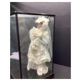 Doll in Display Case