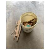 Bucket of miscellaneous wood handles and wood