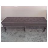 Decorative upholstered bench on wheels