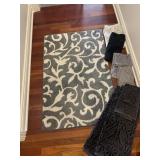 Rug, hand towels and decorative towels