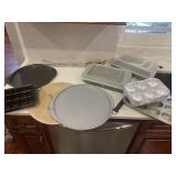 Cake pans, stoneware, pizza pans, and misc