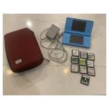 Nintendo DS with games and carrying case