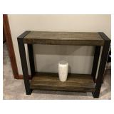 Wooden shelf and vase