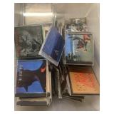 Tote full of miscellaneous cds