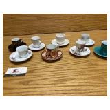 Eight demitasse cups and saucers