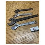 Adjustable wrenches