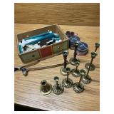 Candle stick holder and a rifle butt