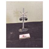 Number 54 Lionel train track crossing