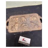Cast iron kitten muffin pan