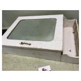 Wooden medicine cabinet with beveled mirror