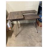 Folding sewing machine table