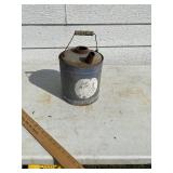 Proximately 2 gallon gas can