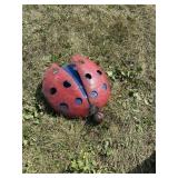 Metal yard art lady bug
