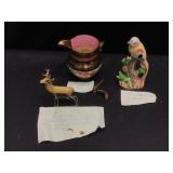 Pitcher, bird and deer