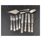 Silverware. R Wallace