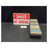 Cassette tapes and smoking sign