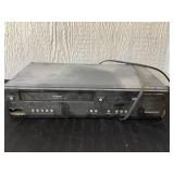 DVD & VCR Player Turns on